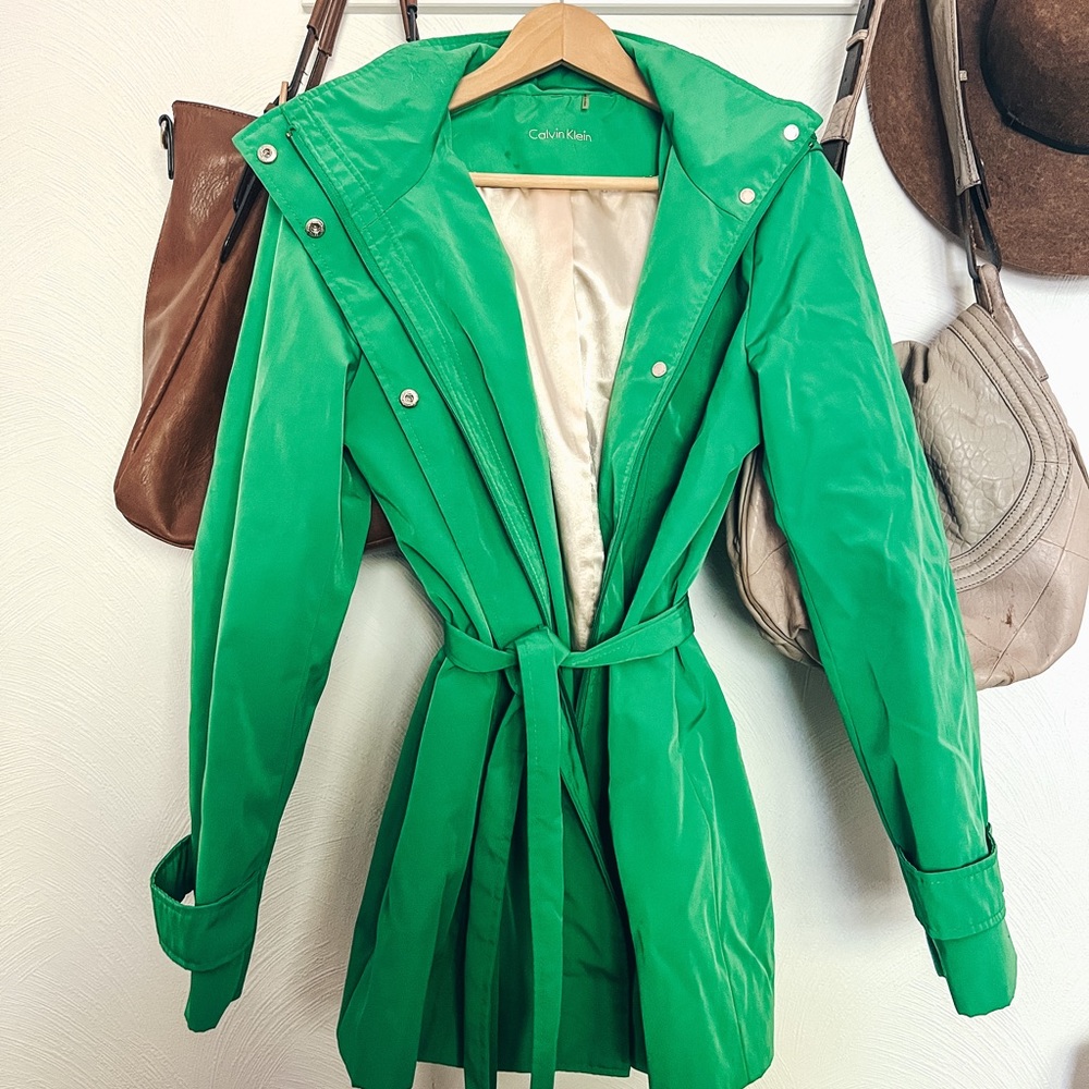 Calvin Klein green rain jacket with detachable hood.